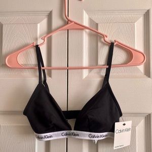 Calvin Klein bra size small. Never worn, with tags